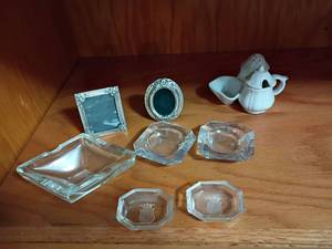 lot 2004 image: Glass Ashtrays, Pewter Picture Frames (2x2) and More   Located in basement