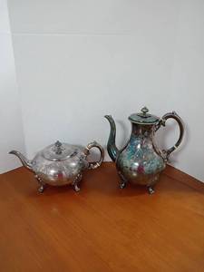 lot 2006 image: Silver Plated Tea and Coffee Pitchers.   Located in basement