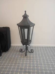 lot 2030 image: 37in. Black Outdoor Pedestal Lantern with Scrolled Metal Base.  Door needs new latch   Located in basement.