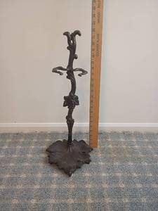 lot 2032 image: Fireplace tools Stand with Leaf Base.  Located in basement