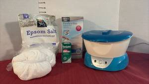 lot 2111 image: Homedics ParaSpa Wax Warmer with Epsom Salt, Systane Eye Drops and Wax Refill