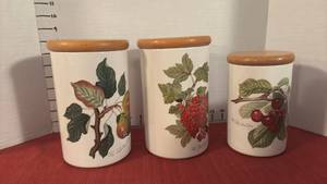 lot 2123 image: Three Ceramic Canisters with Wooden Lids Fruit Motif