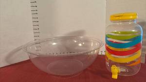 lot 2130 image: Clear Plastic Beverage Dispenser with Colored Bands and Yellow Spigot and Large Plastic Bowl