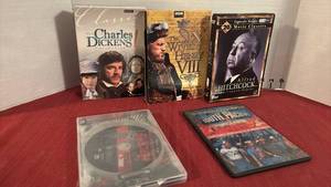 lot 2142 image: DVD Lot 5 Titles Charles Dickens Six Wives Henry VIII Hitchcock South Pacific