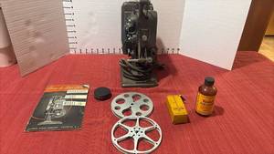 lot 2213 image: Kodak Kodascope Eight Model 70 16mm Film Projector with Reels and Accessories