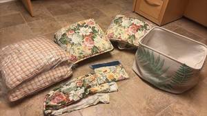 lot 2226 image: 6 Throw Pillows, Extra Upholstery Fabric, and Fabric Basket