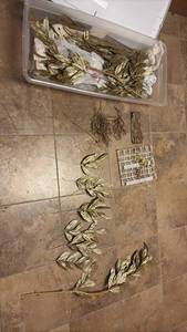 lot 2252 image: Gold Holiday Decor and Sterilite Tub with Lid