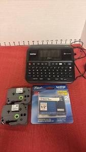 lot 2315 image: Brother P-touch Label Maker with TZE Tape
