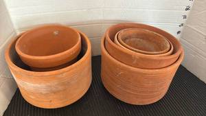 lot 3112 image: 2 Nesting Clay Pot Sets Terracotta Planters