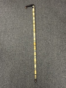 lot 100 image: Stacked possible ivory andor bone, horn handle Scrimshaw cane