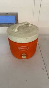 lot 5 image: COTT Orange Cooler with Lid and Handle