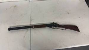 lot 27 image: Lever Action Toy Rifle with Wood Furniture and Metal Loop Lever