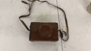 lot 32 image: Kiev Camera with Leather Case and Strap