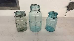 lot 39 image: 3 Glass Canning Jars with Wire Bail Lids ATLAS Ball IDEAL