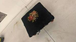 lot 64 image: Black Needlepoint Footstool with Floral Design and Wood Feet