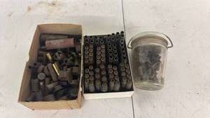 lot 82 image: Spent Shotgun &amp Rifle Shell Casings Mixed Lot Two Boxes and Glass Jar