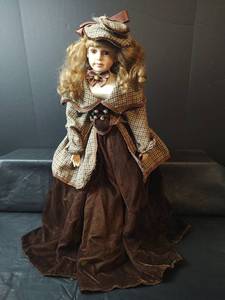 lot 202 image: Porcelain Collector Doll, 27 inches tall