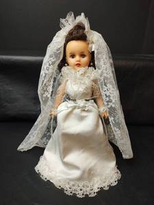 lot 207 image: Bride Doll in White Lace Wedding Gown with Veil, 11in tall