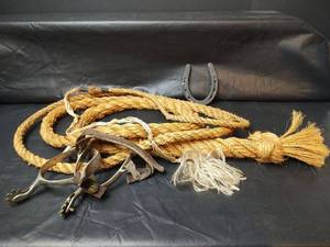 lot 210 image: Homemade Thick Coiled Manila Hemp Rope Whip with Spurs and Horseshoe