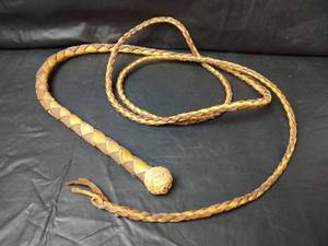 lot 211 image: Braided Leather Bull Whip with Rawhide Knob, 9 ft