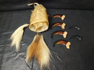 lot 212 image: Bear Claws with Natural Colorization, Rawhide and Hides