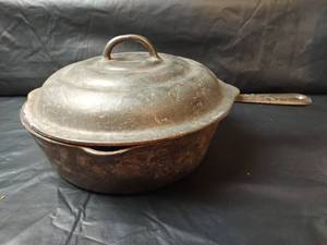 lot 229 image: Crescent Fdy Co Ozark Deep Cast Iron Skillet with Lid - 10 inches