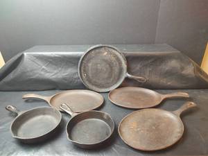 lot 255 image: Cast Iron Skillets and Griddle - Made in USA