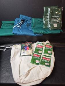 lot 332 image: Outdoor Gear Rain Poncho, Storage Bags, Laundry Bags, and Coleman String-Tie Mantles