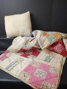 lot 584 image: Handmade Lap Quilt(Well Worn) and Pillow