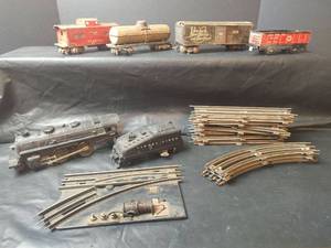 lot 792 image: Vintage Assorted Train Cars and Tracks