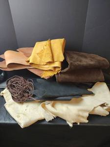 lot 841 image: Leather and Suede Pieces