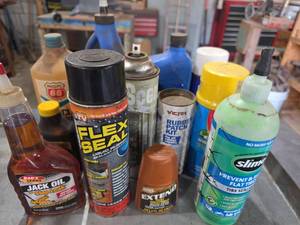 lot 1000 image: Mixed Automotive & Shop Chemicals - Flex Seal, Slime Tire Sealant, Bars Leaks, Super Tech, Victor, Duro, Phillips 66