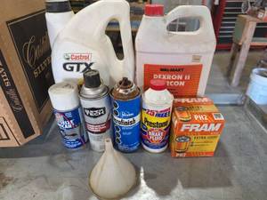 lot 1003 image: Automotive Fluids & Filter Lot �� Castrol GTX 10W-40, Dexron II ATF, Prestone DOT 3, FRAM PH2