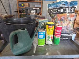 lot 1011 image: Gardening Lot Watering Can, Vermiculite, Fertilizers, Insecticide, Flower Food