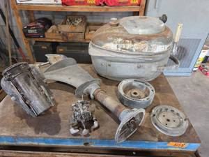 lot 1068 image: Antique Firestone Boat Motor Parts