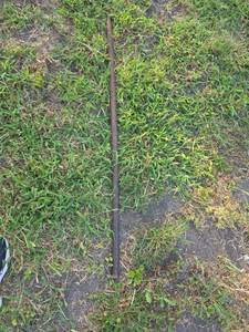 lot 1215 image: Solid Metal Ground Pry Bar with Pointed End