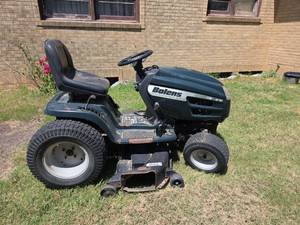 lot 1232 image: Bolens 21 HP 46 in. Lawn Tractor with Mower Deck- runs and cuts