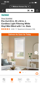 lot 18037 image: StyleWell Pre-Cut 23 in. W x 64 in. L Cordless Light Filtering White Vinyl Mini Blind with 1 in. Slats - Retail $8