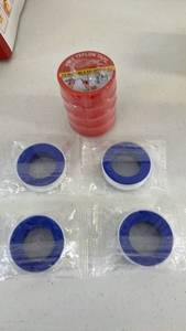 lot 18084 image: PTFE Teflon Tape 12 inch x 520 inch with 4 Blue Thread Seal Tape Rolls and four red for gas - Retail $0