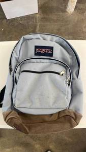 lot 18133 image: JanSport Backpack Light Blue Brown Two-Tone ( a little dirty from shipping I guess) - Retail $39