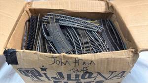 lot 1 image: Model Train Set Lot with Track, Controllers, and Accessories