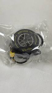 lot 65 image: Invicta Racing Tire-Shaped Keychain IG0346