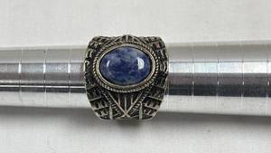 lot 72 image: Ring with Blue Stone Center and Ornate Metal Band