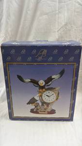 lot 84 image: Ashley Belle Eagle Figurine Quartz Clock with Wood Base