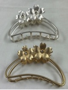 lot 97 image: Two Metal Flower Hair Clips with Rhinestone Centers Silver Gold