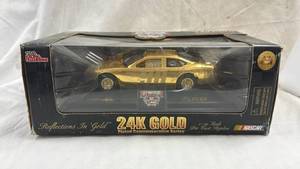 lot 206 image: Racing Champions 24K Gold Plated NASCAR 50th Anniversary Die Cast 124 Scale