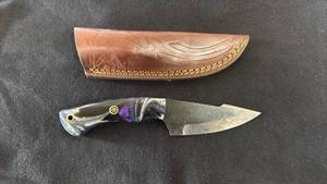 lot 7 image: Fixed Blade Knife with Purple Handle and Leather Sheath