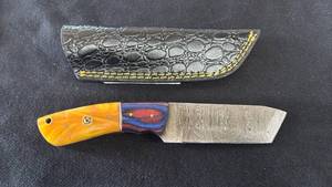 lot 16 image: Custom Knife with Patterned Blade and Orange Handle