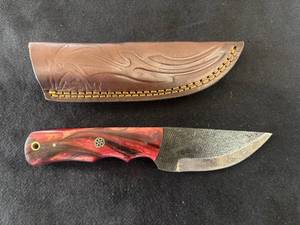 lot 17 image: Fixed Blade Knife Red and Black Handle with Leather Sheath