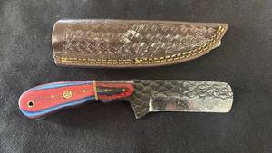 lot 28 image: Fixed Blade Knife with Red and Blue Handle and Leather Sheath